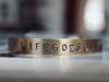 Hand Stamped LIFEGOESON cuff