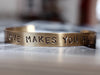 Hand Stamped LOVE MAKES YOU ALIVE cuff