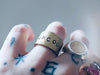 Hand stamped UNCOOL ring