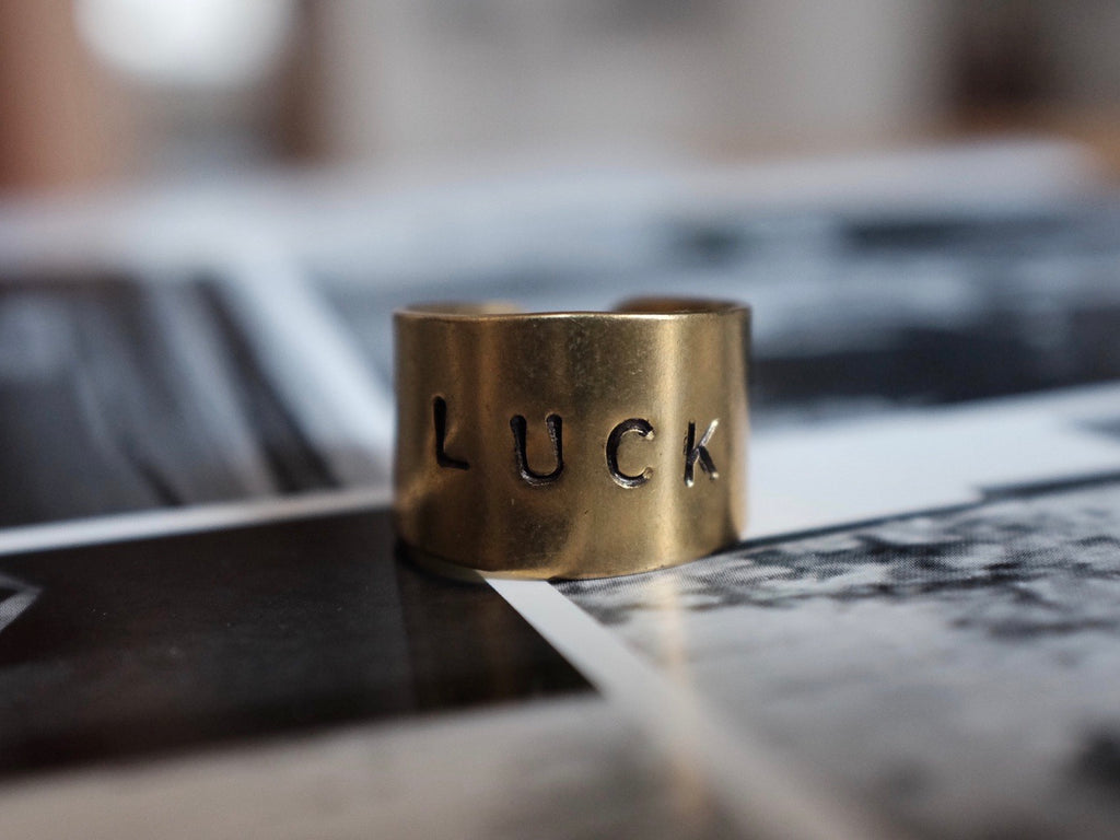 Hand stamped LUCK ring