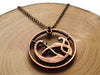 Handcut Irish coin "Ornamental bird" necklace